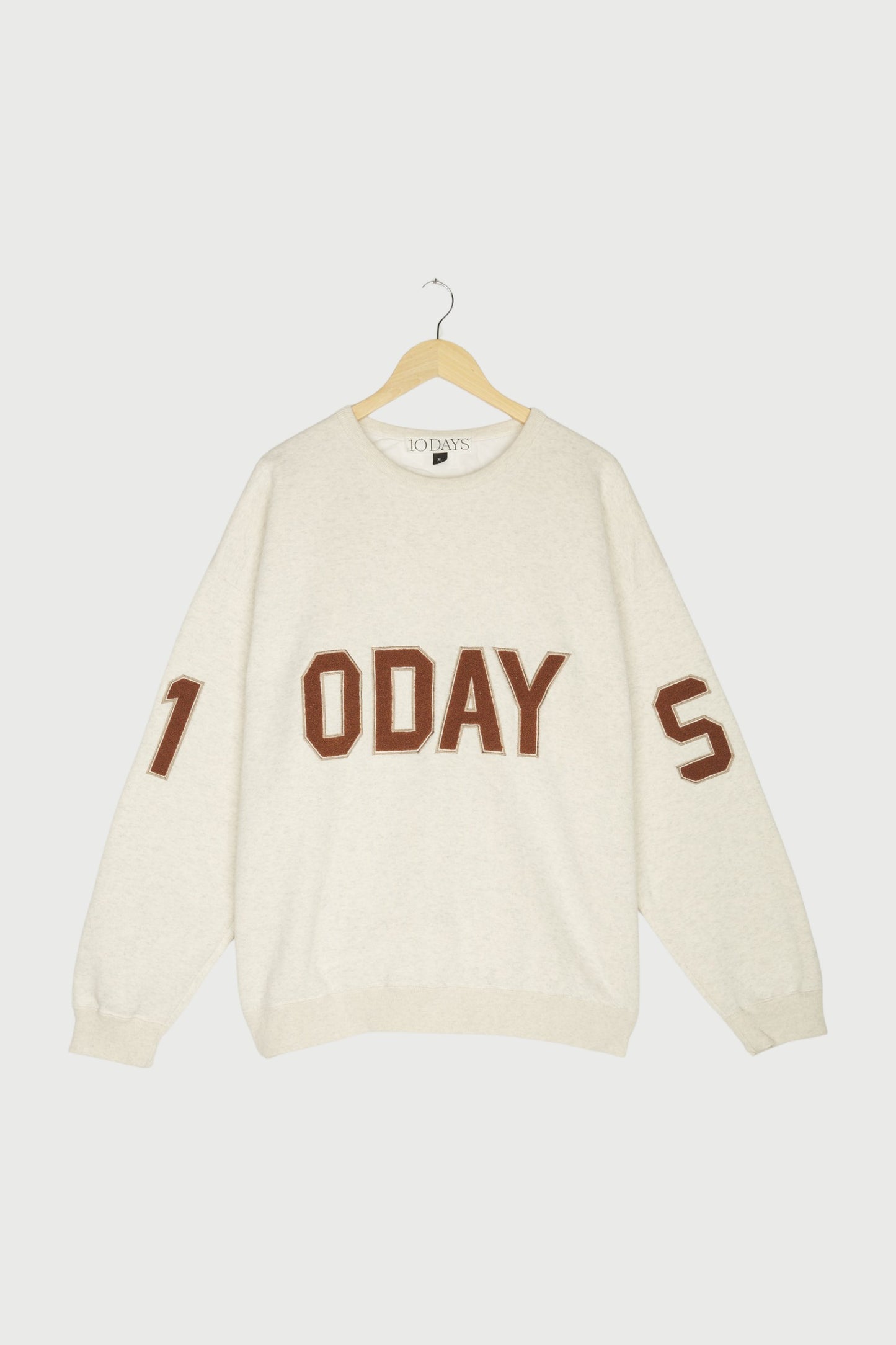 statement sweater logo